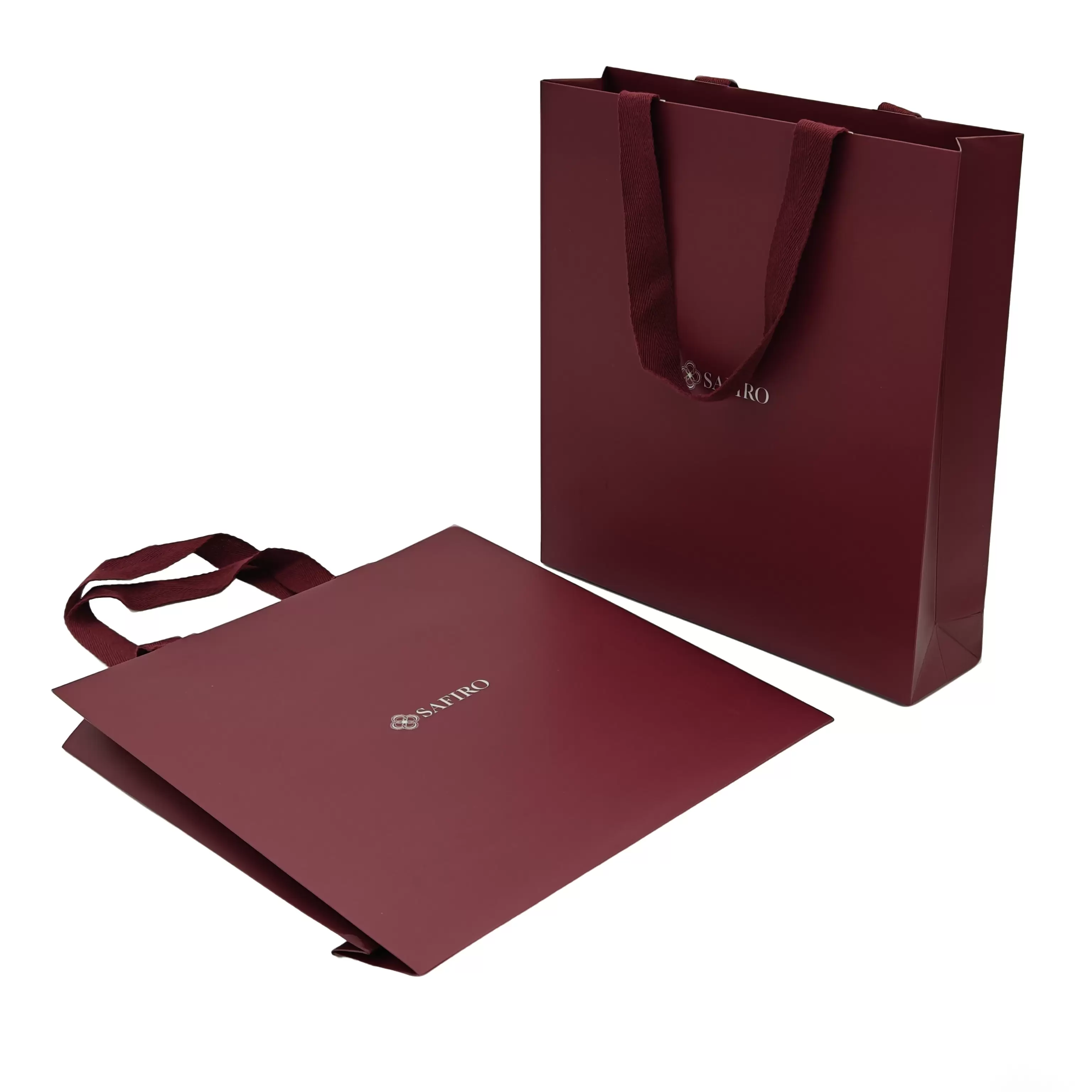 Borse di carta con manici in tessuto